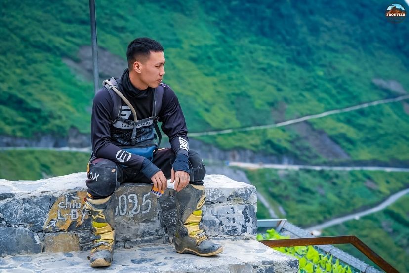 Motorbike riders following a scenic Ha Giang itinerary through mountain villages
